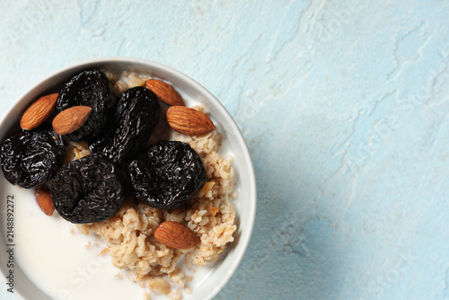 Bowl of tasty oatmeal with ...