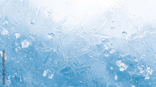 Frozen blue ice texture with deep cracks and air bubbles