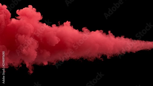 Thick red smoke trail isolated on black background