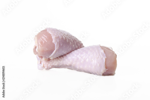 Foto Fresh Raw Chicken Thighs with Skin on White Background - Premium Farm to Table P