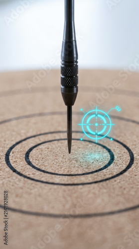 Dart key performance indicator concept with dart hitting bullseye target symbolizing precision and success in business strategy