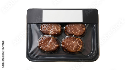 Raw Beef Medallions in Vacuum Sealed Plastic Tray with Blank Label Isolated on Black Background for Food Packaging Mockup