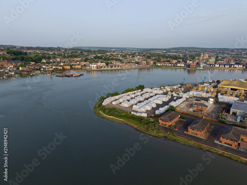 Fotografie Industrial Estate Medway and Rochester town by the river Medway at sunrise in Kent, UK