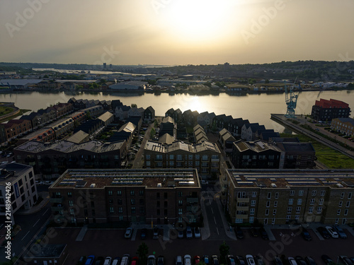 Obraz na plátně Sunrise above Industrial Estate Medway and Rochester town by the river Medway in Kent, UK