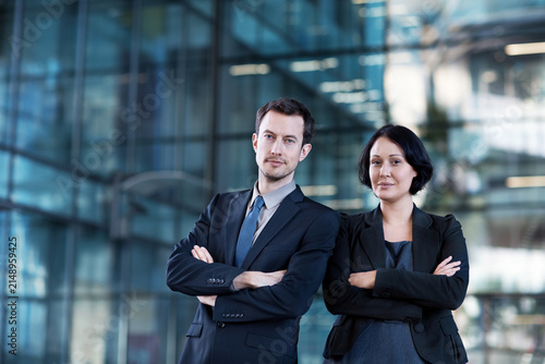 Business people, arms crossed and portrait in city for consultant, asset management or investor. Private equity associate, venture capitalist and corporate agency with man and woman in New York