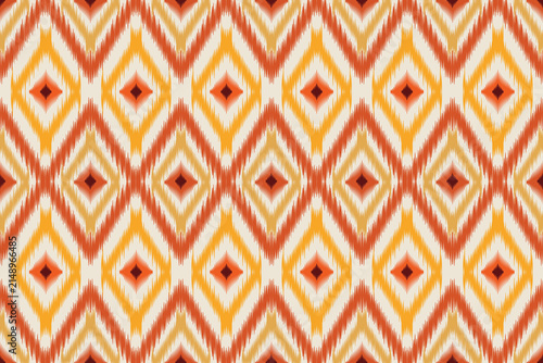 Photography Seamless ikat pattern background in warm ethnic style
