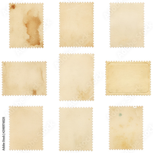 Set of nine vintage postage stamps with aged paper texture and torn perforated edges