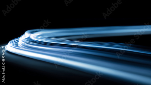Abstract Blue Light Trails on Black Background