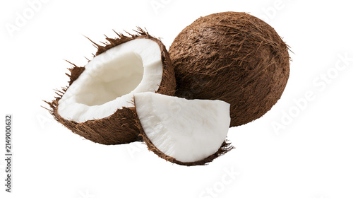 Whole and halved coconut with white flesh and brown fibrous shell