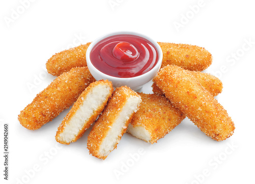 Фотография Fish fingers sticks with ketchup isolated on white background.