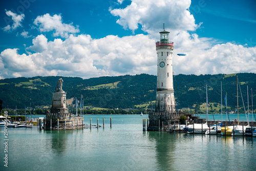 Historic Lindau harbor with lighthouse and lion statue on Lake Constance ideal for travel and tourism