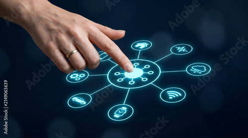 Futuristic Internet of Things interface with central IoT hub connected to smart devices and digital ecosystem icons