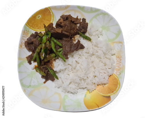 white jasmine rice and spicy stir-fried pork and green bean in white plate on white background top view