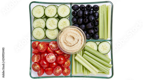 Obraz na płótnie Vegetable platter with hummus cherry tomatoes cucumber slices olives, and celery