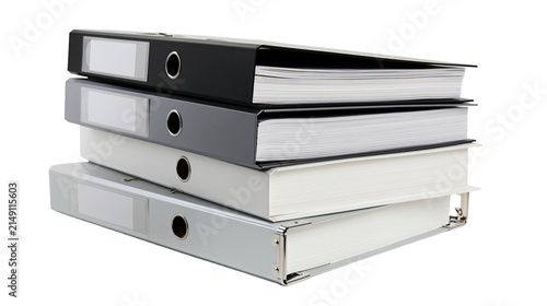 Stack of four ring binders black grey white, and silver
