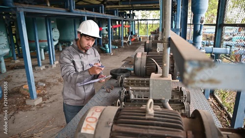 Industrial Technician Performing Pump Inspection and Maintenance in Water Treatment Facility