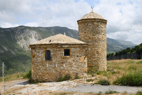 Mosque on Caucasus mountains background. Matlas plateau. Dagestan, Russia