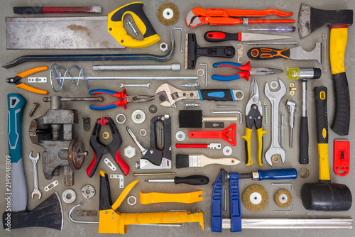 Canvastavla Flat lay of old and new hand tools on concrete background