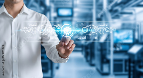 Professional engineer using advanced digital interface to monitor manufacturing production efficiency in a modern smart factory setting