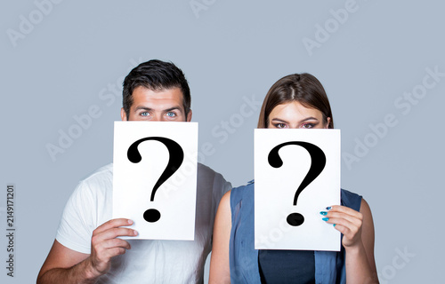 Couple holding paper question mark. Anonymous, man and woman question, incognita. Problems and solutions. Couple in quarrel. Quarrel between people. Problem in couple, question mark