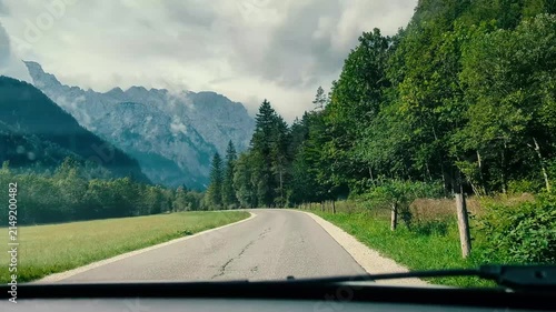 Breathtaking panoramic view of green Logar valley and high alpine mountain peaks in Slovenia