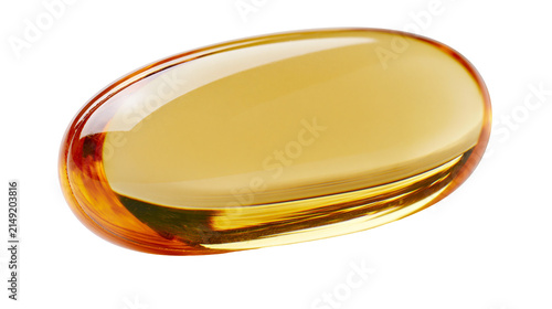 Gelatin capsule filled with golden liquid