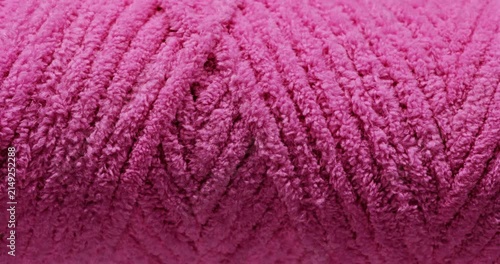 Pink Chenille Yarn Texture. Macro view of soft fuzzy yarn fibers with dense plush surface and slow camera movement.