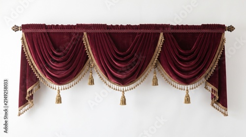 Elegant burgundy velvet valance with gold tassels, luxury theater curtains on white background, ornate window drapery