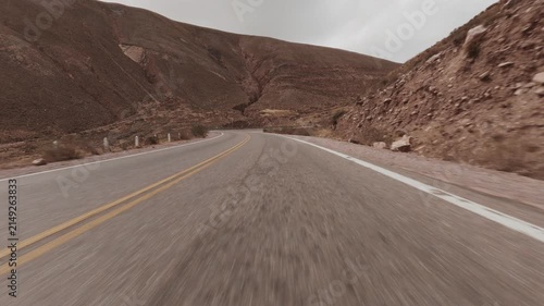 Driving POV on scenic mountain road in Salta Argentina