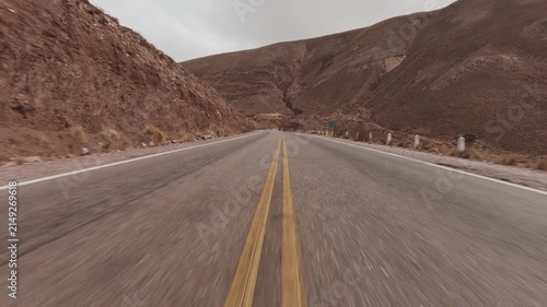 Driving POV on scenic mountain road in Salta Argentina