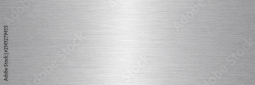 Brushed metal texture with silver finish and horizontal grain, polished stainless steel background with central light reflection, industrial aluminum plate for modern tech design layouts.