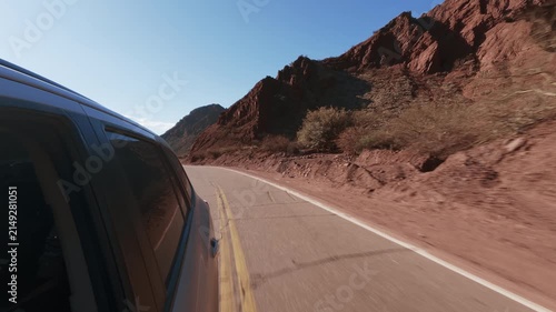 Driving POV on scenic National Route 68 in Quebrada de las Conchas Salta Argentina. Rear View SUV