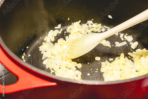Fresh onion on a wooden cutboard  homemade cooking