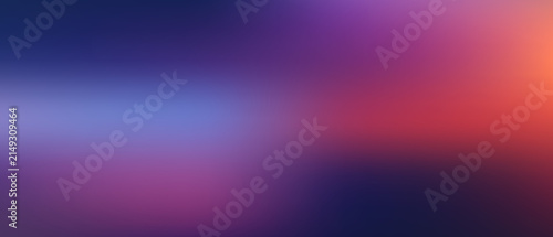 Blurred gradient background, with deep blue, purple, and orange tones