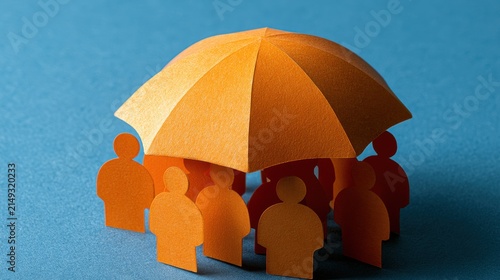 Group of paper cutout people figures standing together under large orange umbrella symbolizing protection safety and support concept on blue background