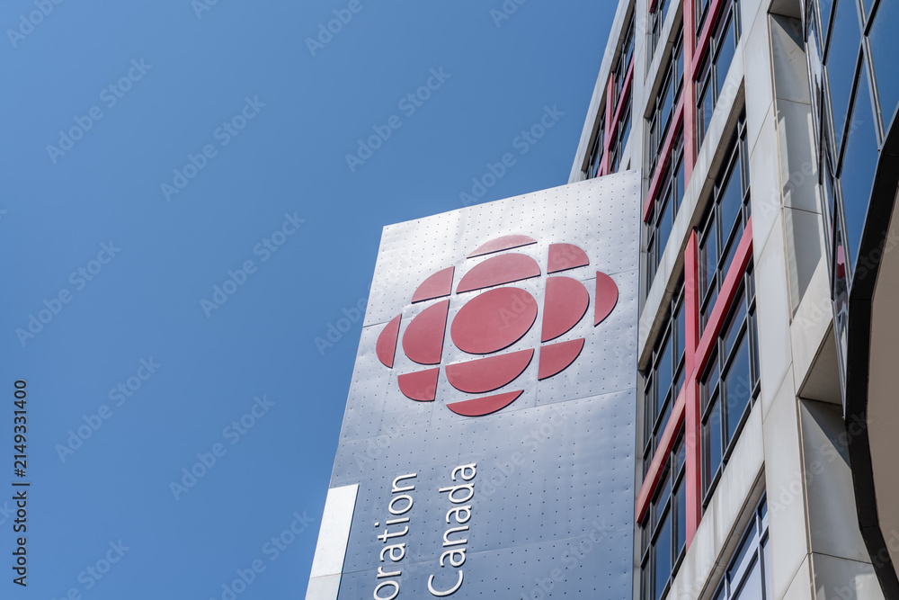 Fototapeta premium Toronto, ON, Canada - August 5, 2026: The logo and signage of the Canadian Broadcasting Corporation (CBC) is seen at their Broadcasting Centre in Toronto, ON, Canada. 