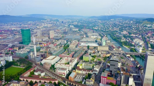 Zurich, Switzerland. Panorama of the city from the air. Gewerbeschule area, Limmat river. Drone footage, Departure of the camera