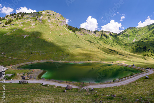 Beautiful lake of Nyon-Guérin located in Morzine, French Alps, Haute-Savoie department, France.