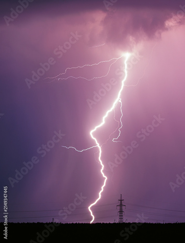Storm, lightning strike in the horizon, thunder concept