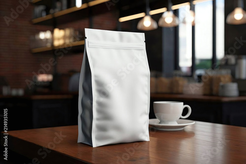 Realistic white coffee bag mockup placed on a cafe table with a cozy coffee shop background. Perfect for branding, packaging, and product presentation.