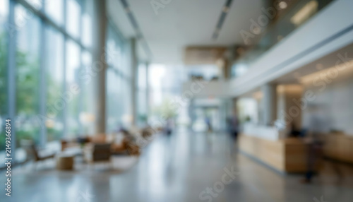 Fully blurred startup office lobby with abstract minimalist architecture, warm reception forms and soft business silhouettes. Premium commercial background for entrepreneurship and business.