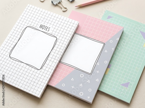 Colorful Notebooks and Stationery on Desk.