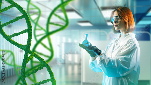 Foto Biotechnology Laboratory: A researcher with glasses examines a sample in a flask against the background of DNA and the scientific environment