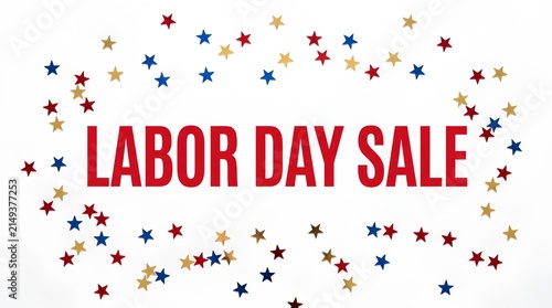 Labor Day Sale typography surrounded by red and blue star confetti.