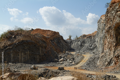 Konstfotografi Open Pit Rock Quarry With Excavator and Workers on Dirt Road