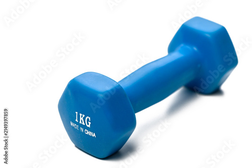 Quadro su tela Bright blue dumbbell resting on a clean surface, perfect for fitness routines an
