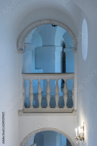 Obraz na płótnie Decorative arched window and balustrade on the facade of a historic building
