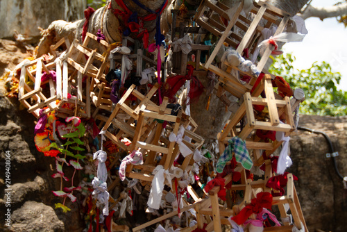 Принти на полотні Wooden Ladders and Cloth Offerings Tied to Sacred Tree at Koneswaram Temple of T