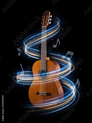 Wooden acoustic guitar with spiraling light trails and musical notes on black background