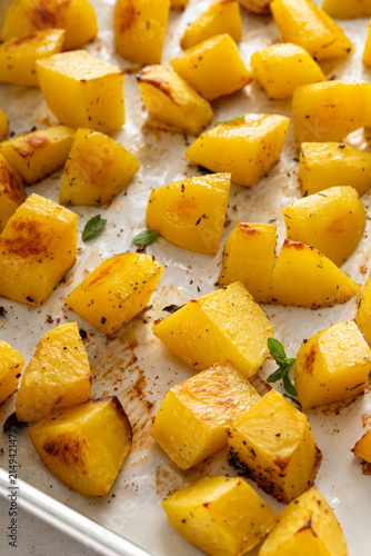 Oven roasted potatoes on a sheet pan cooked with garlic, herbs and spices